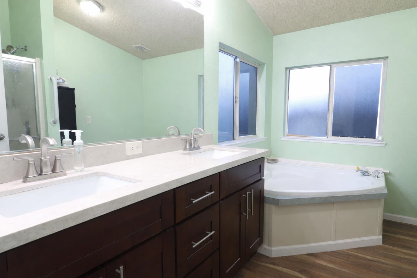16711 Marsh Creek Road, Unit 74 Clayton, CA 94517 - Photo 10 of 11 a bathroom with a sink and a mirror