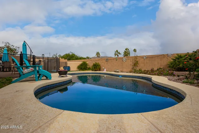 a view of a swimming pool with a terrace