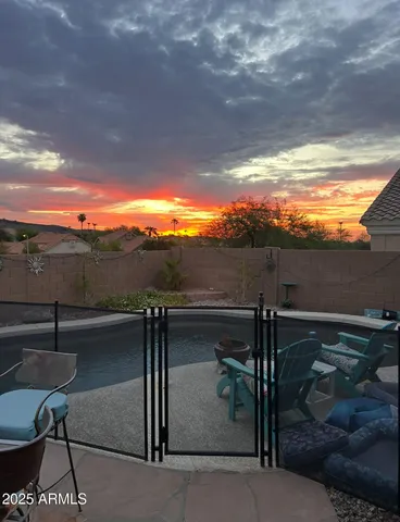 a view of balcony with furniture and wooden floor
