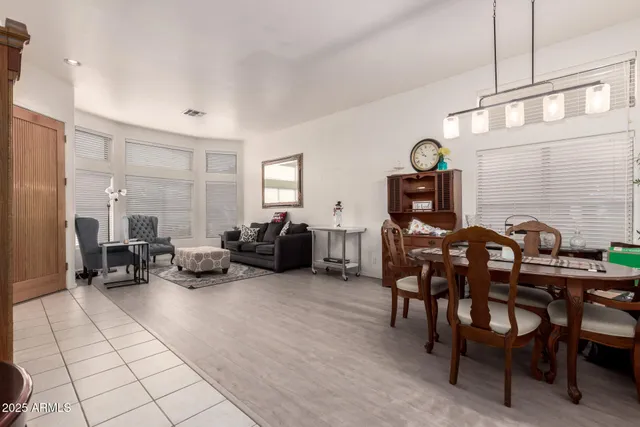 a view of a livingroom with furniture and a window