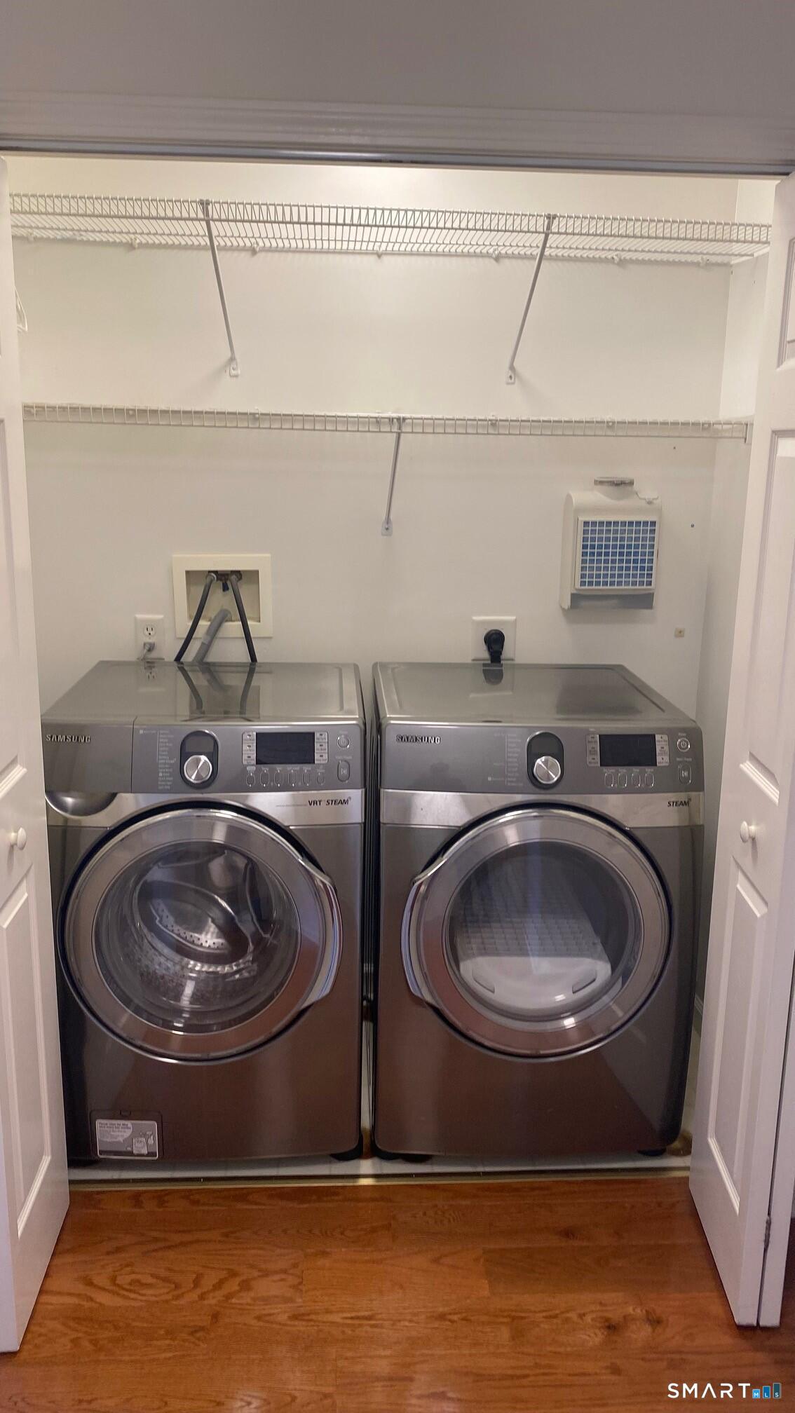 403 Larson Drive, Unit 403 Danbury, CT 06810 - Photo 12 of 34 a storage and utility room with two washing machine
