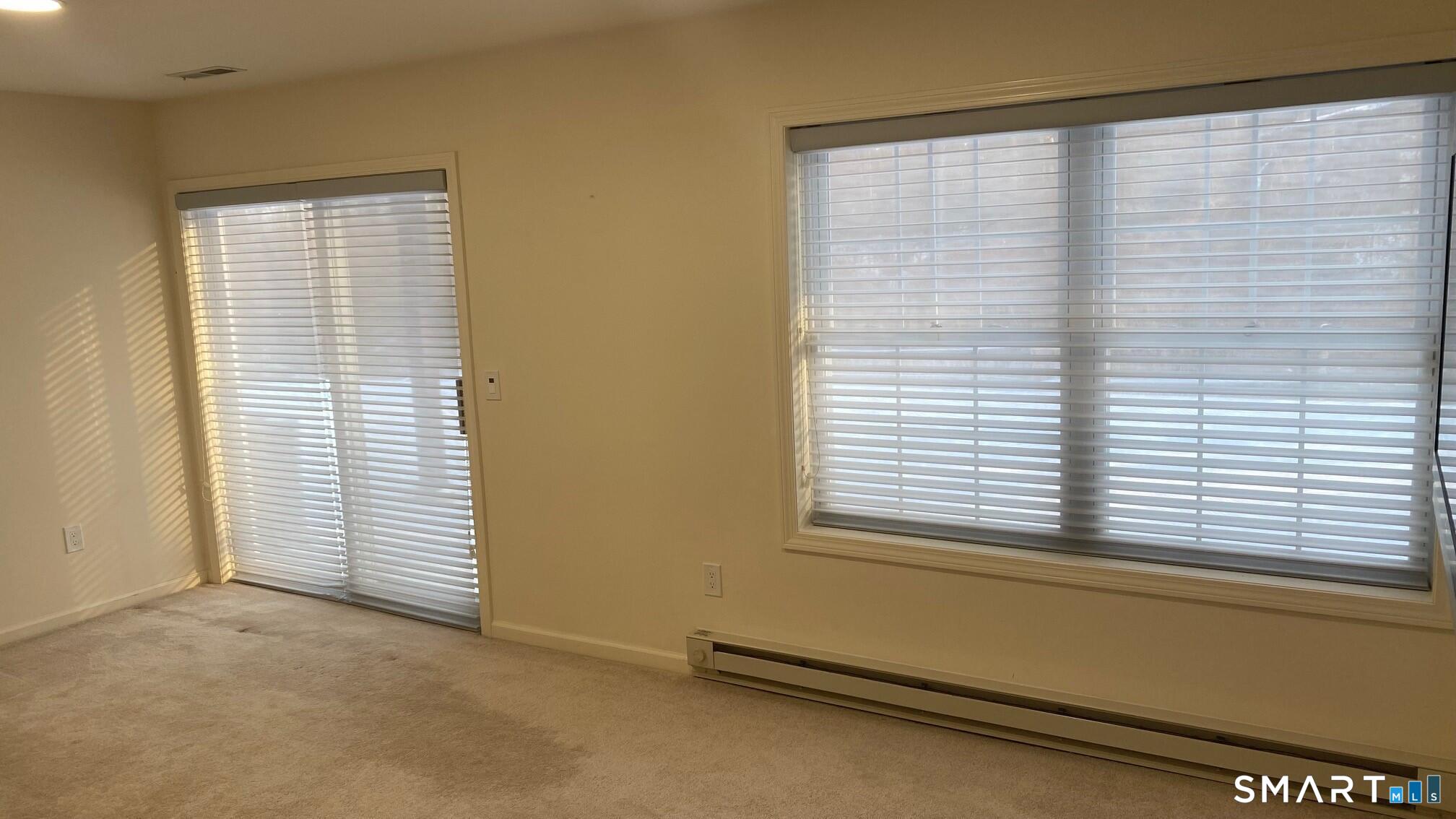 403 Larson Drive, Unit 403 Danbury, CT 06810 - Photo 26 of 34 a view of a room that has a window