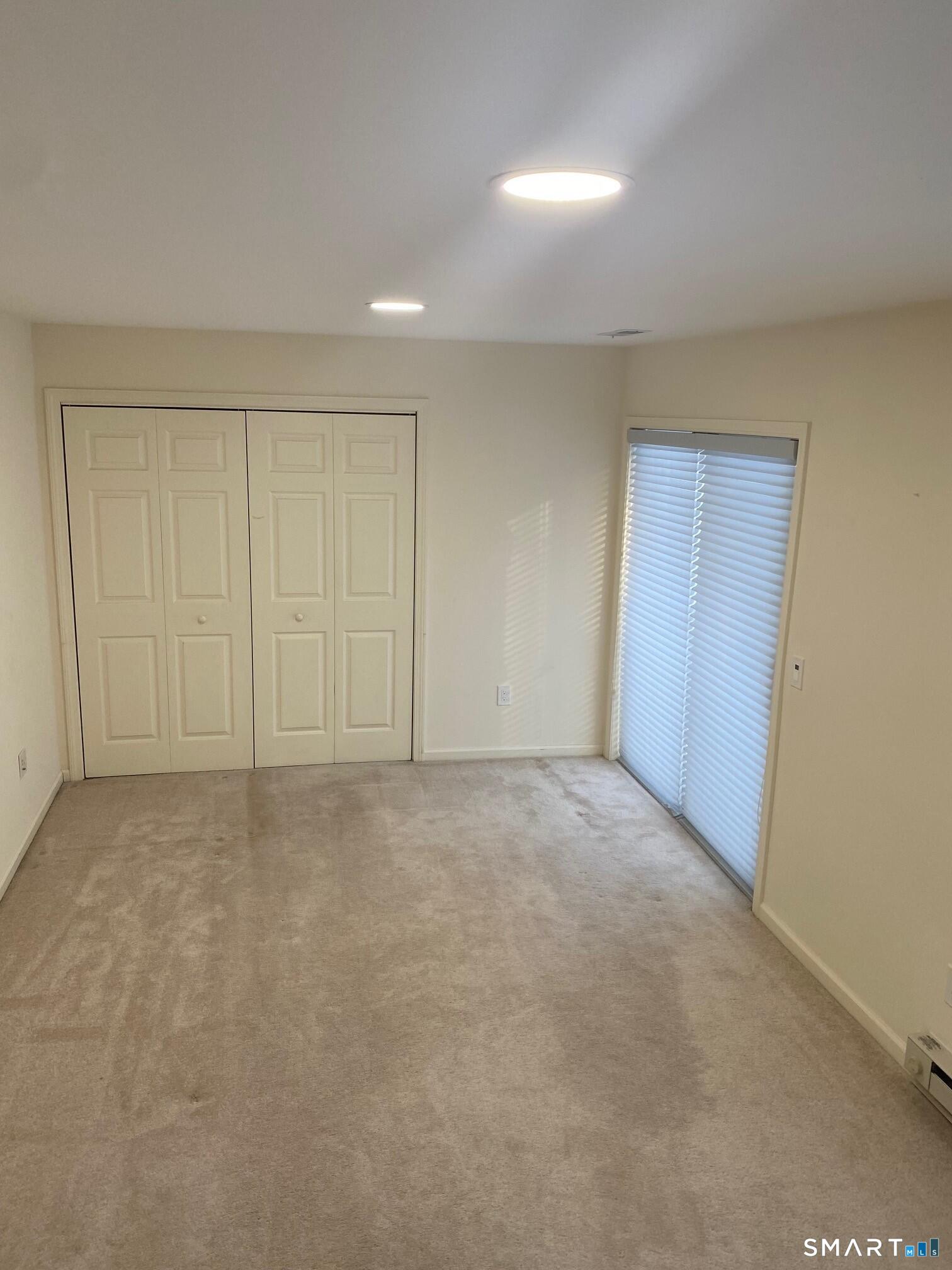 403 Larson Drive, Unit 403 Danbury, CT 06810 - Photo 29 of 34 a view of an empty room