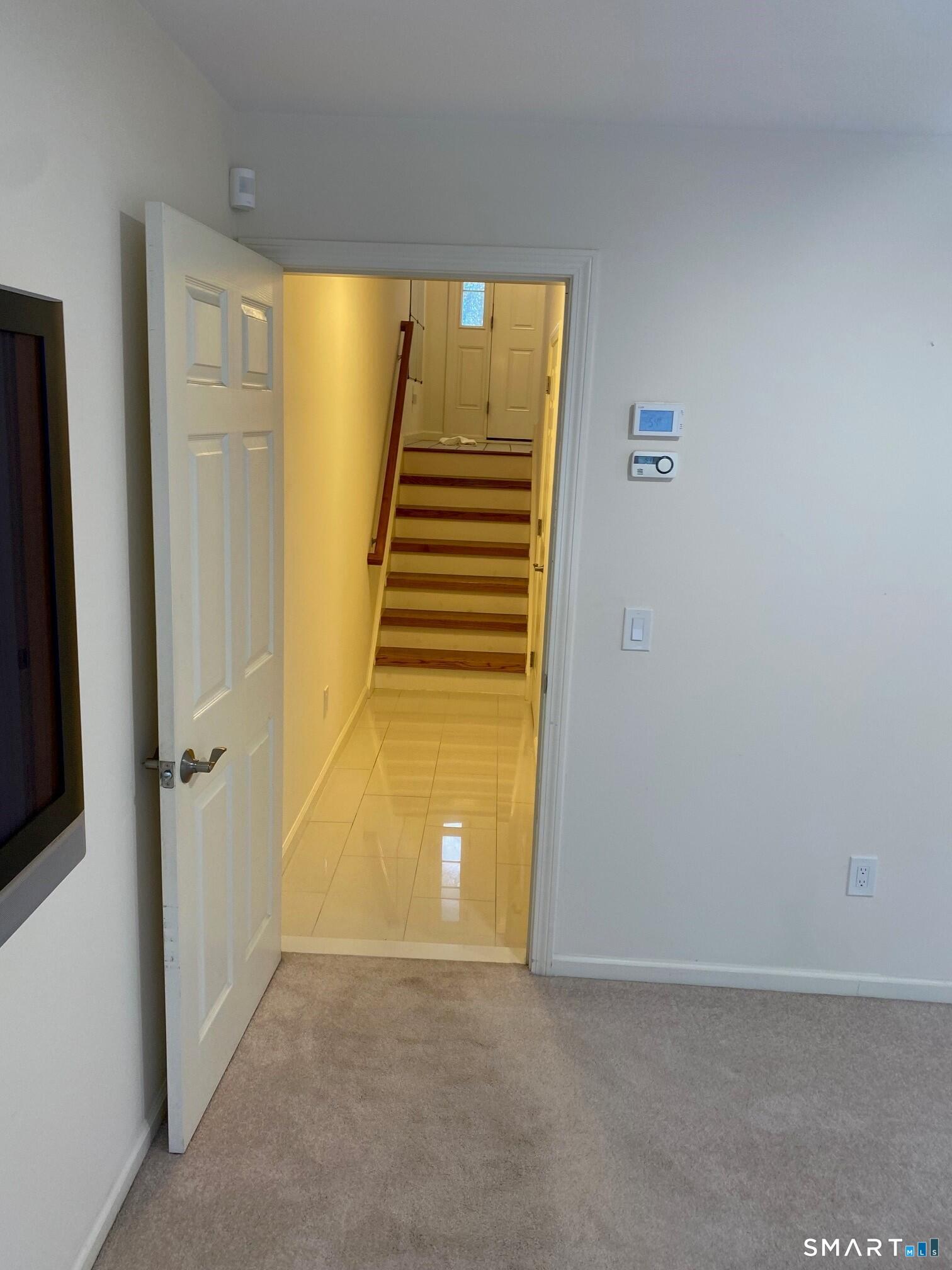 403 Larson Drive, Unit 403 Danbury, CT 06810 - Photo 30 of 34 a view of entryway with wooden floor