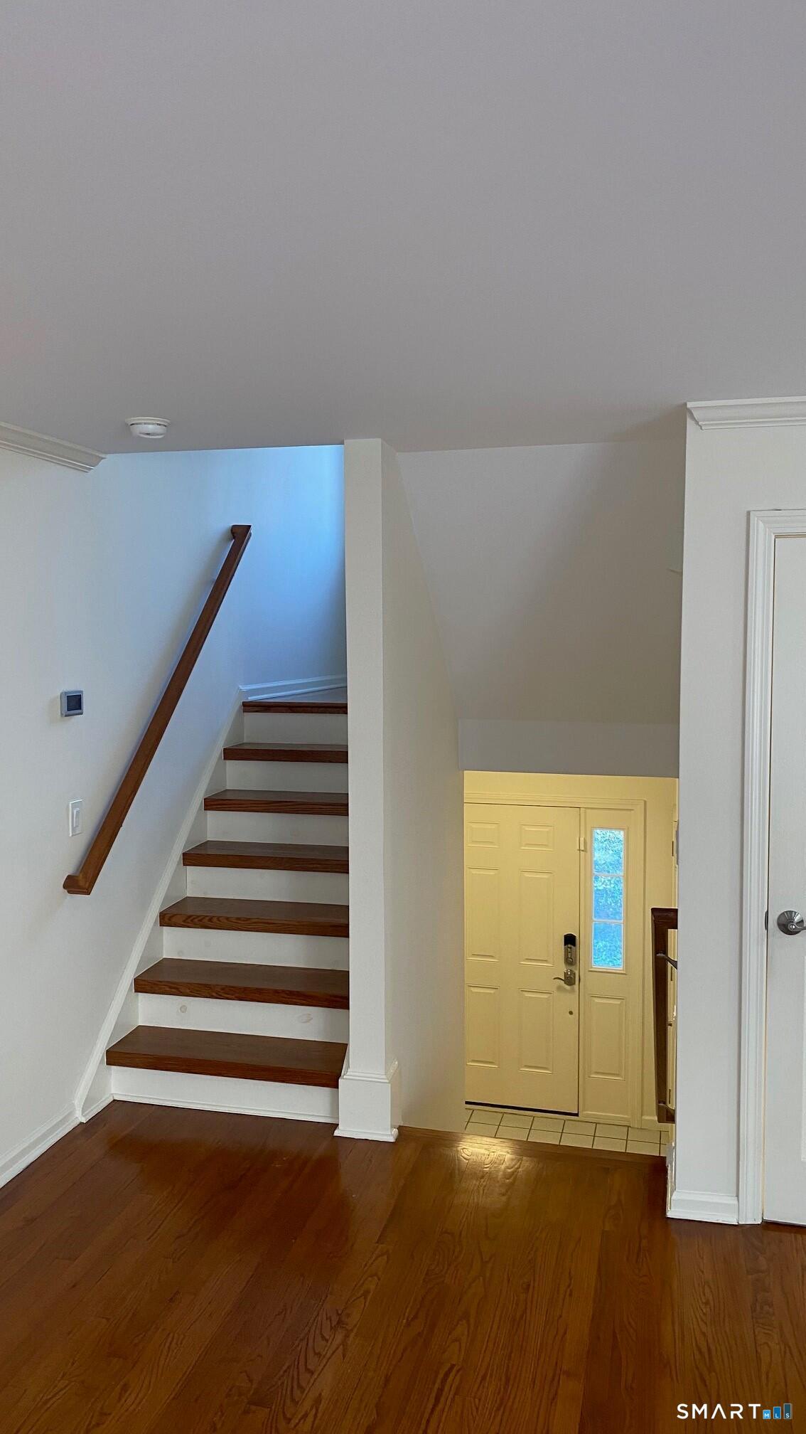 403 Larson Drive, Unit 403 Danbury, CT 06810 - Photo 8 of 34 a view of entryway with wooden floor