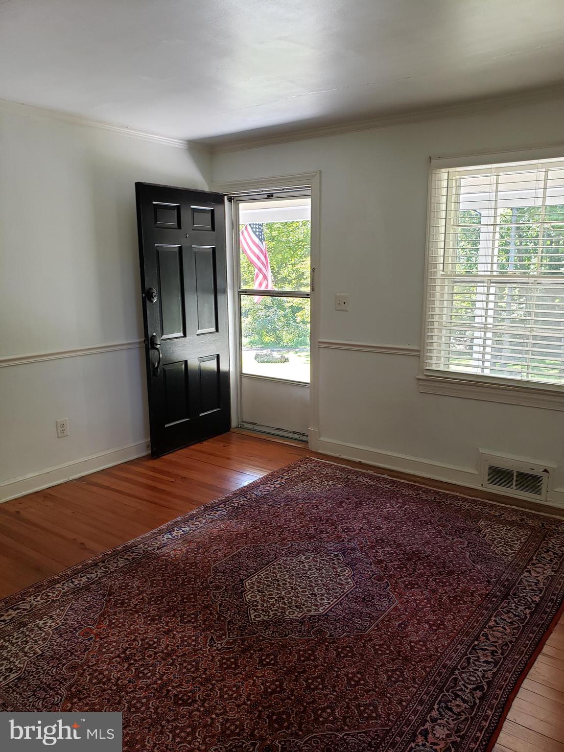 38799-38795 Hughesville Road Leesburg, VA 20175 - Photo 5 of 9 a view of a livingroom with a window