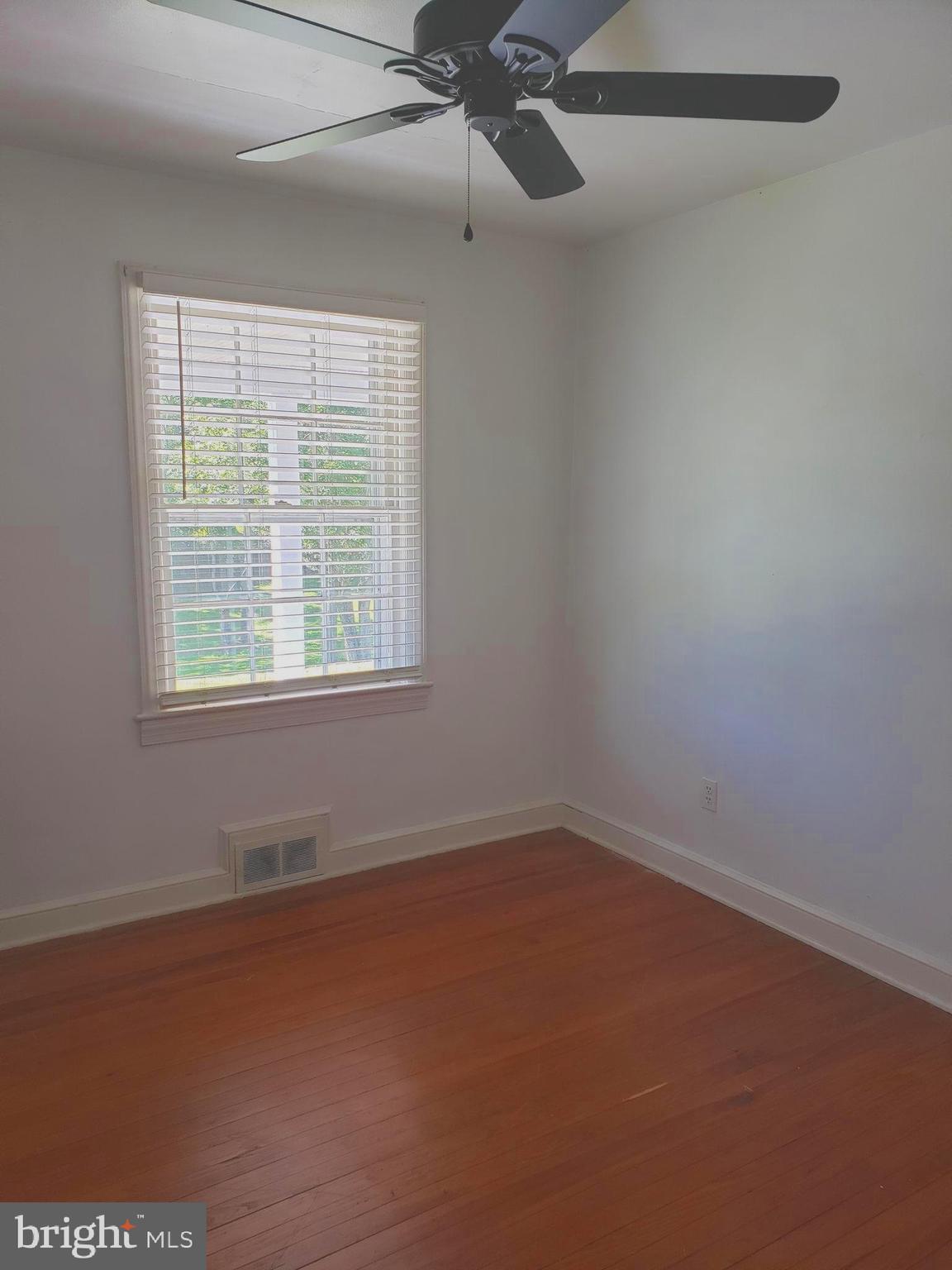 38799-38795 Hughesville Road Leesburg, VA 20175 - Photo 9 of 9 an empty room with a window