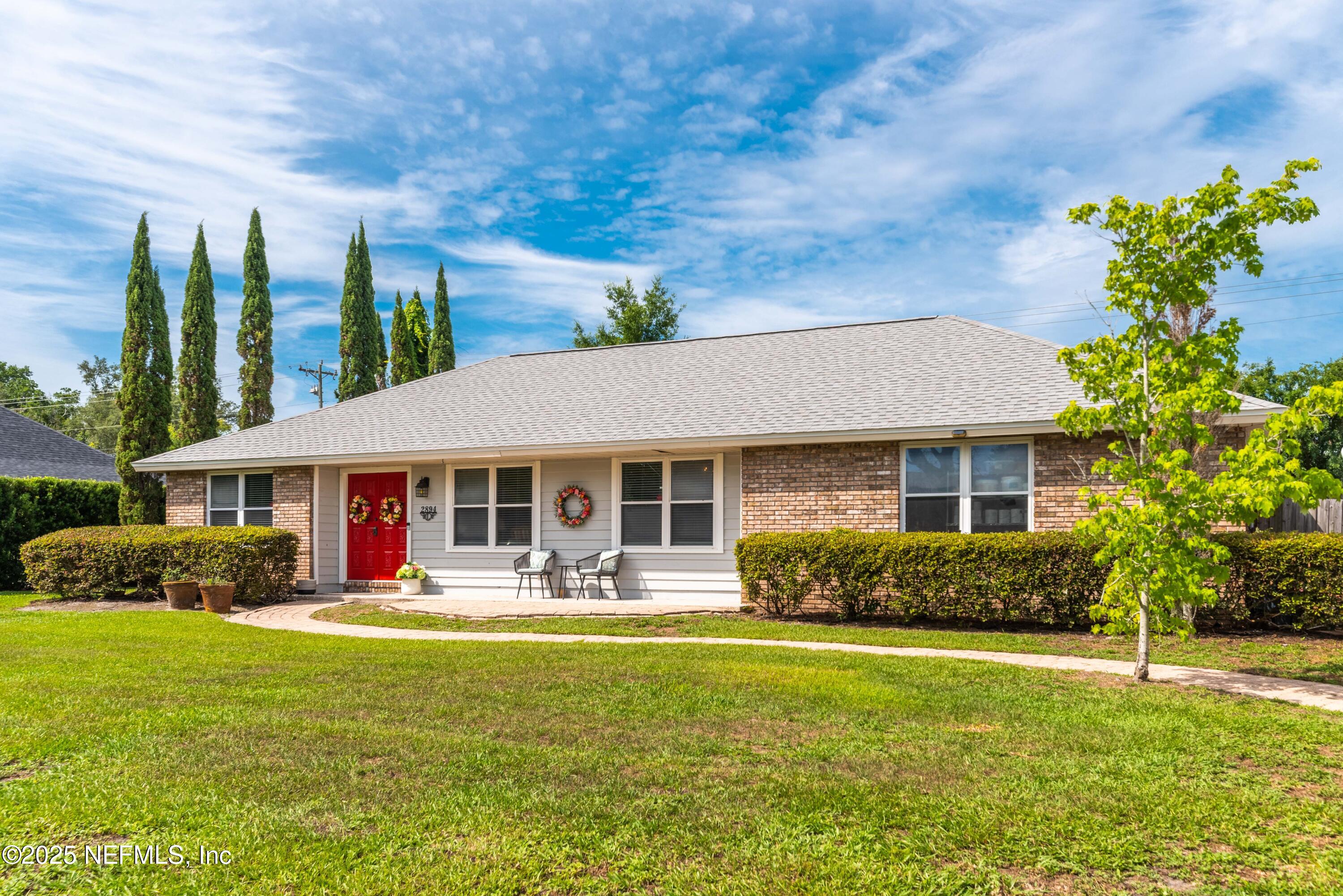 2894 Circle Ridge Drive Orange Park, FL 32065 - Photo 1 of 30 a front view of a house with garden