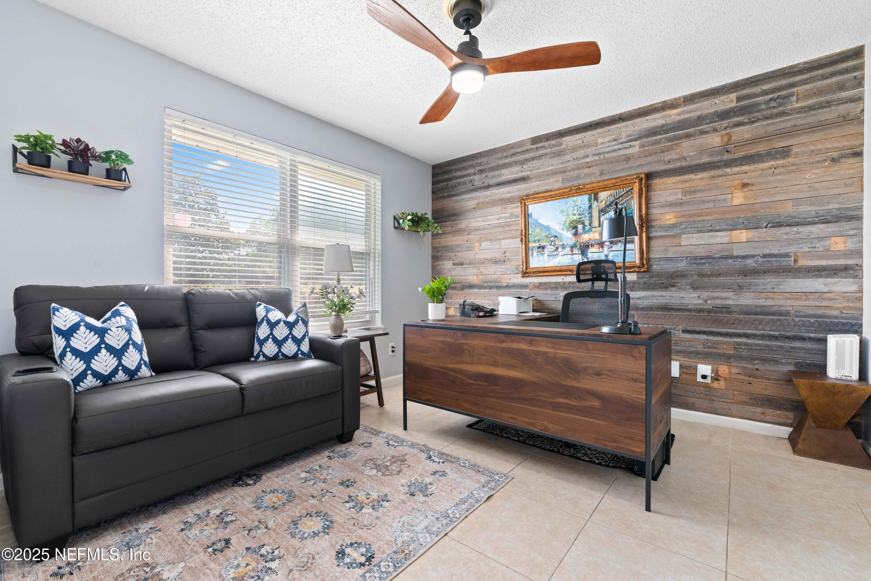2894 Circle Ridge Drive Orange Park, FL 32065 - Photo 23 of 30 a living room with furniture and a window