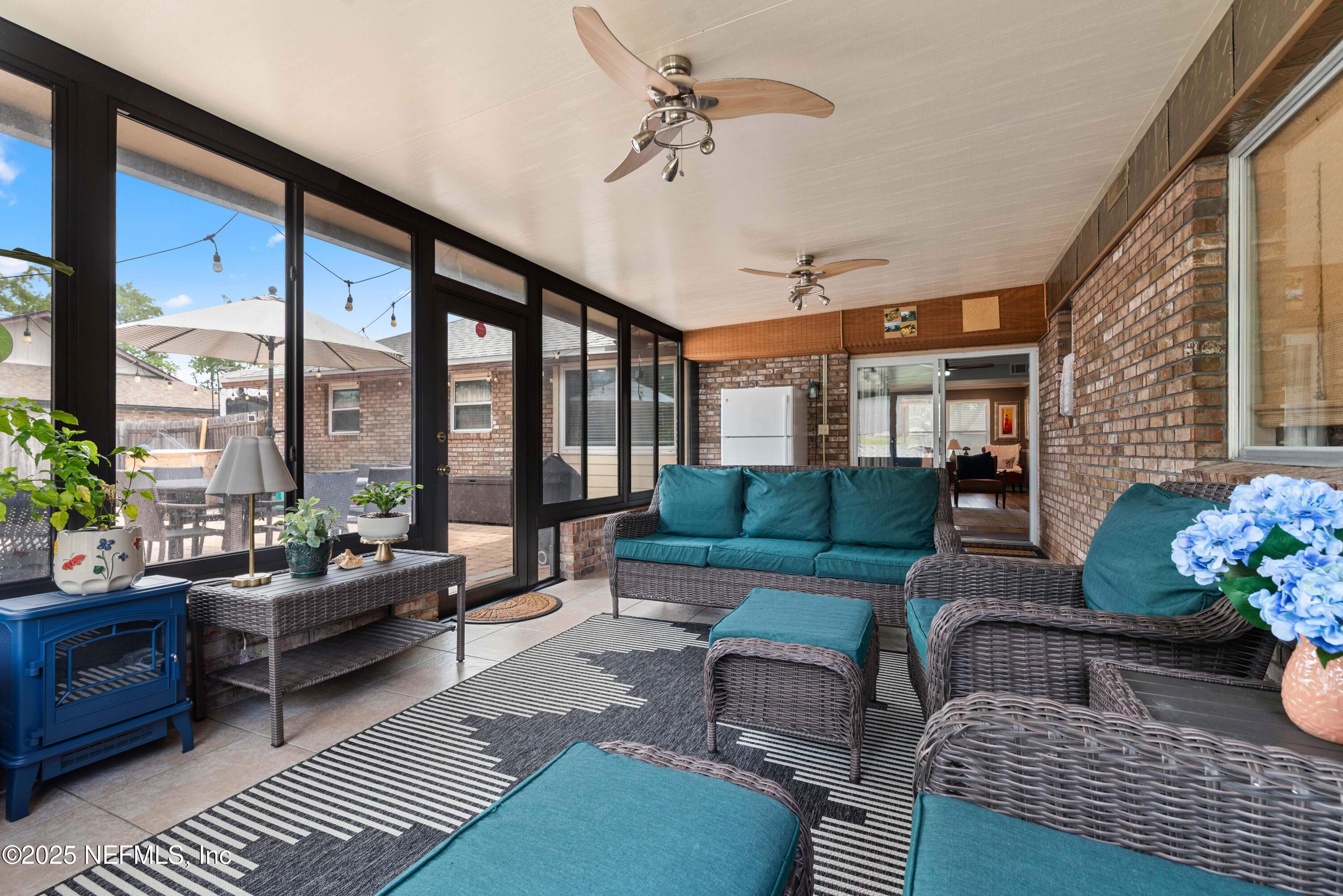 2894 Circle Ridge Drive Orange Park, FL 32065 - Photo 27 of 30 a living room with furniture and a large window