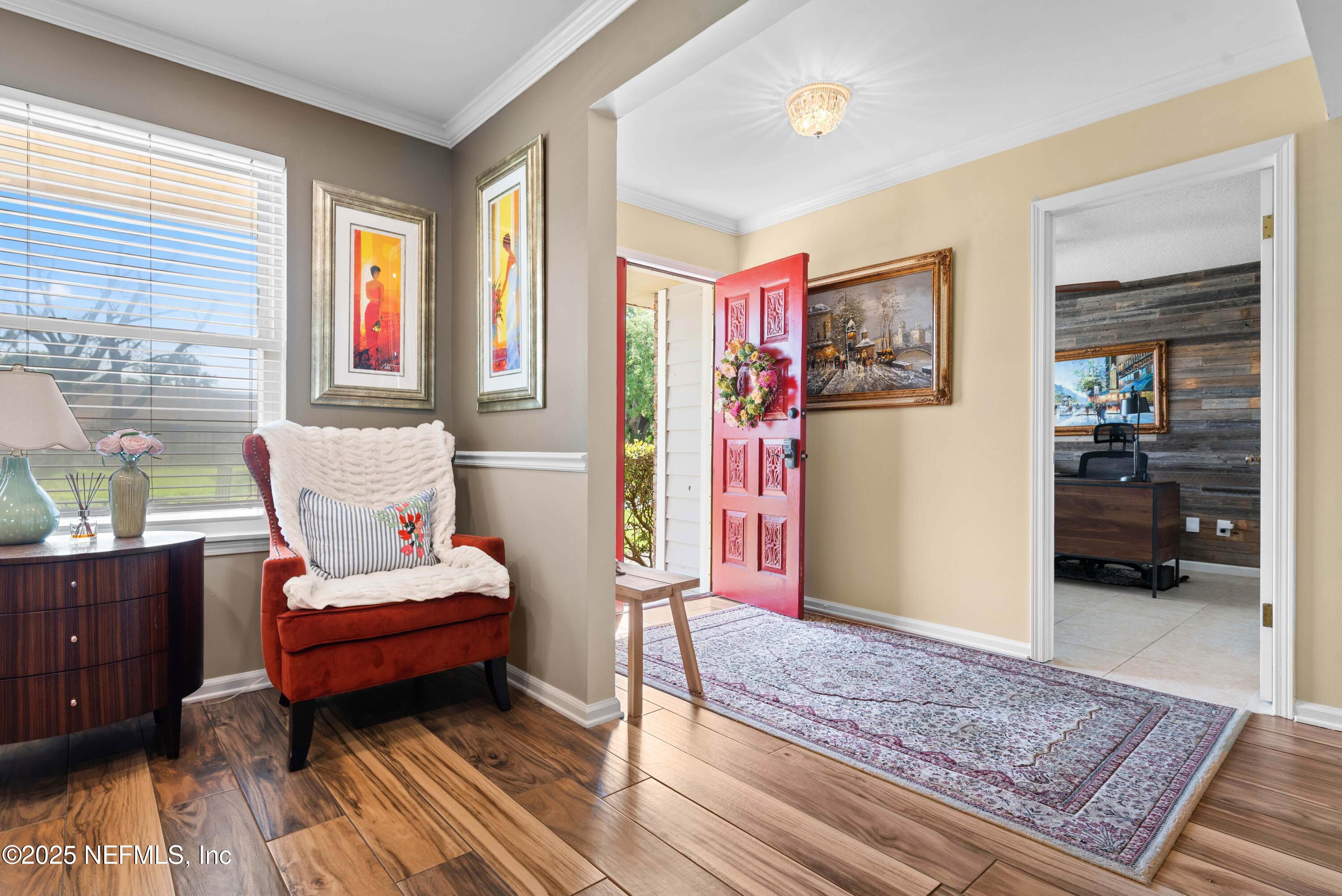 2894 Circle Ridge Drive Orange Park, FL 32065 - Photo 3 of 30 a living room with furniture and a rug