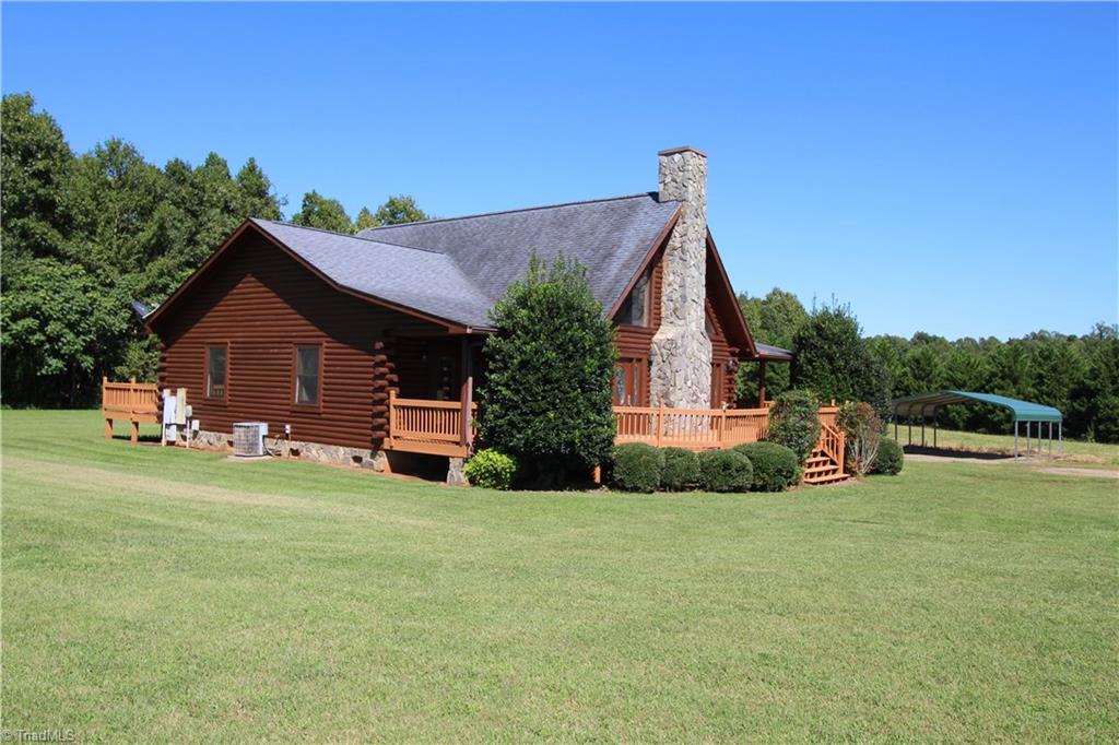 6867 Big Tree Road Liberty, NC 27298 - Photo 5 of 28 Side view showing carport