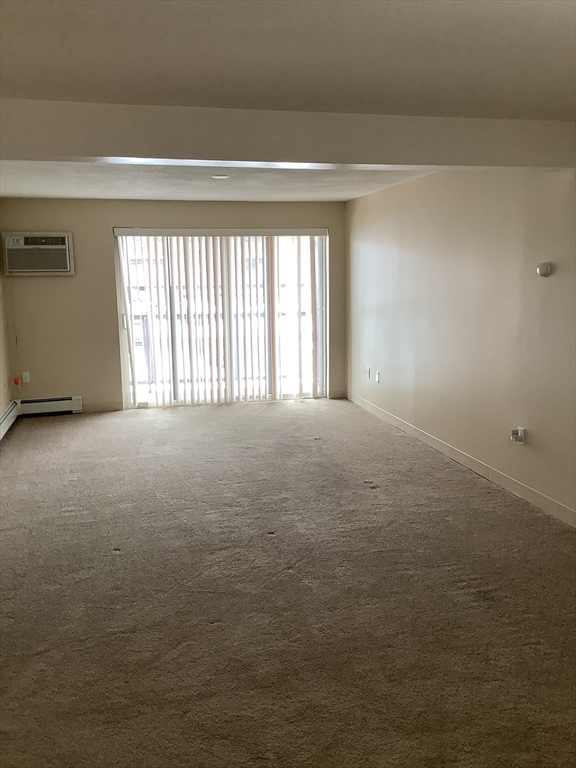 175 Ward Street, Unit 30 Revere, MA 02151 - Photo 12 of 20 a view of an empty room with a window