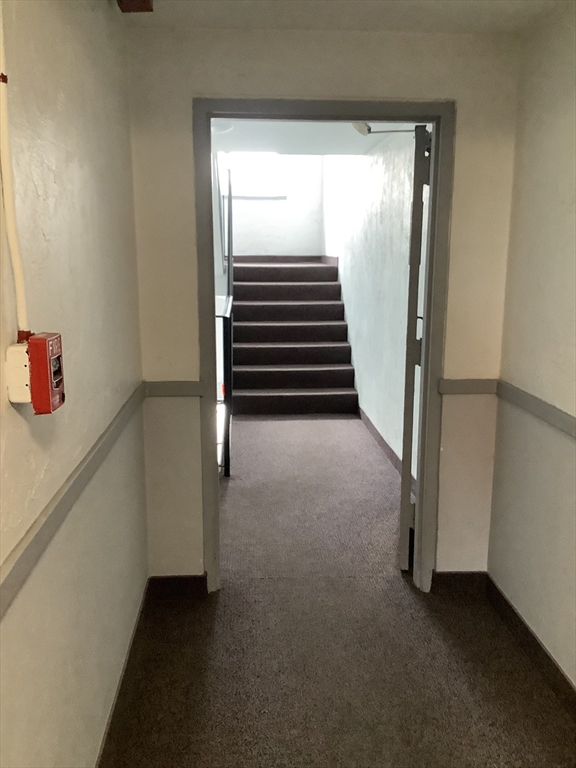 175 Ward Street, Unit 30 Revere, MA 02151 - Photo 18 of 20 a view of an empty room with stairs