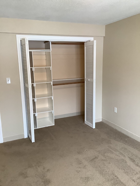 175 Ward Street, Unit 30 Revere, MA 02151 - Photo 5 of 20 a view of an empty room with a closet