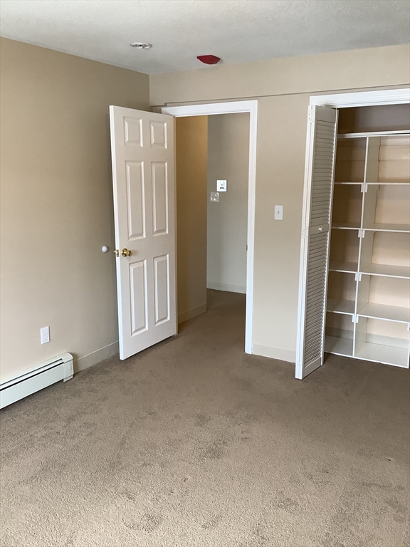 175 Ward Street, Unit 30 Revere, MA 02151 - Photo 7 of 20 a view of an empty room with a window