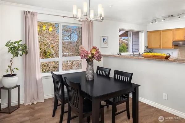 a view of a dining room with furniture window and outside view