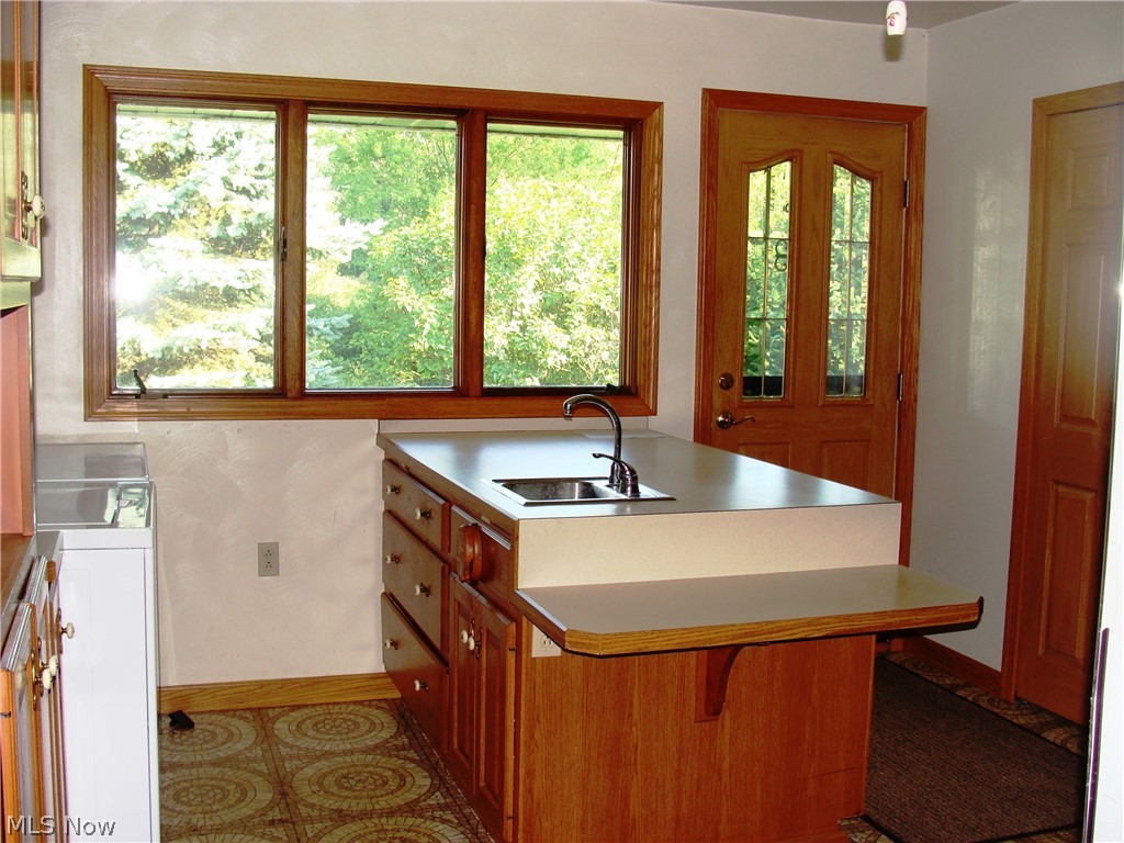 31990 Tower Road Salem, OH 44460 - Photo 9 of 24 back of kitchen with laundry