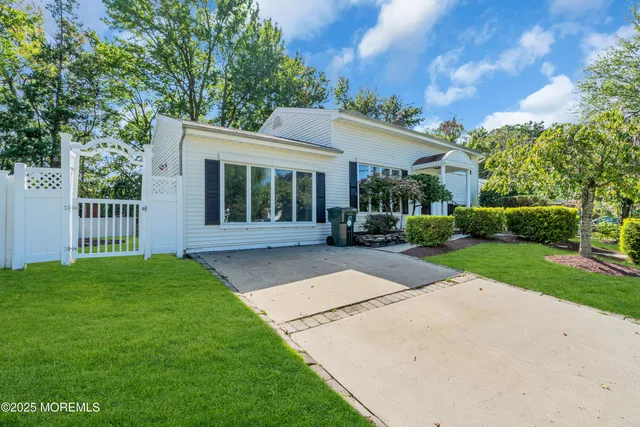 a view of a house with a garden