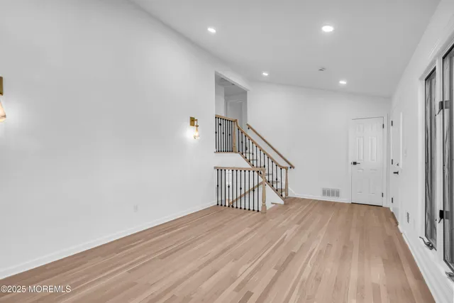 a view of entryway with wooden floor