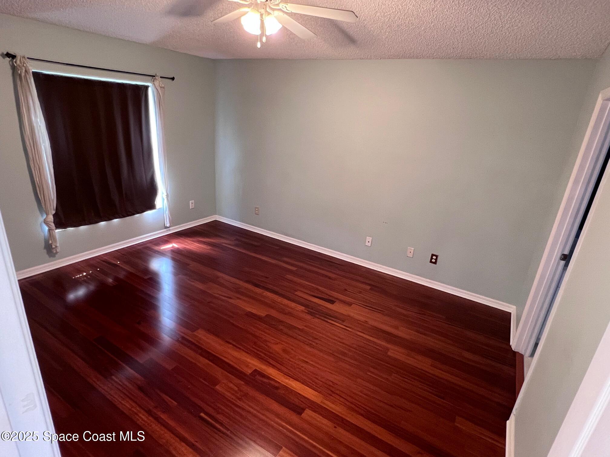 2149 Caledonia Place Melbourne, FL 32940 - Photo 9 of 18 a view of hallway with stairs