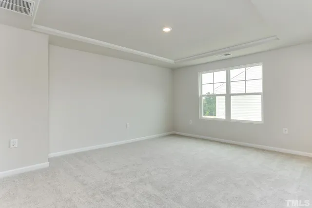a bathroom with a shower sink and mirror
