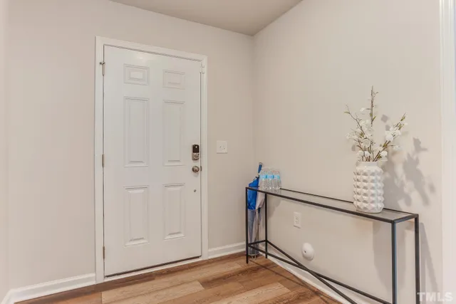 a patio with table and chairs