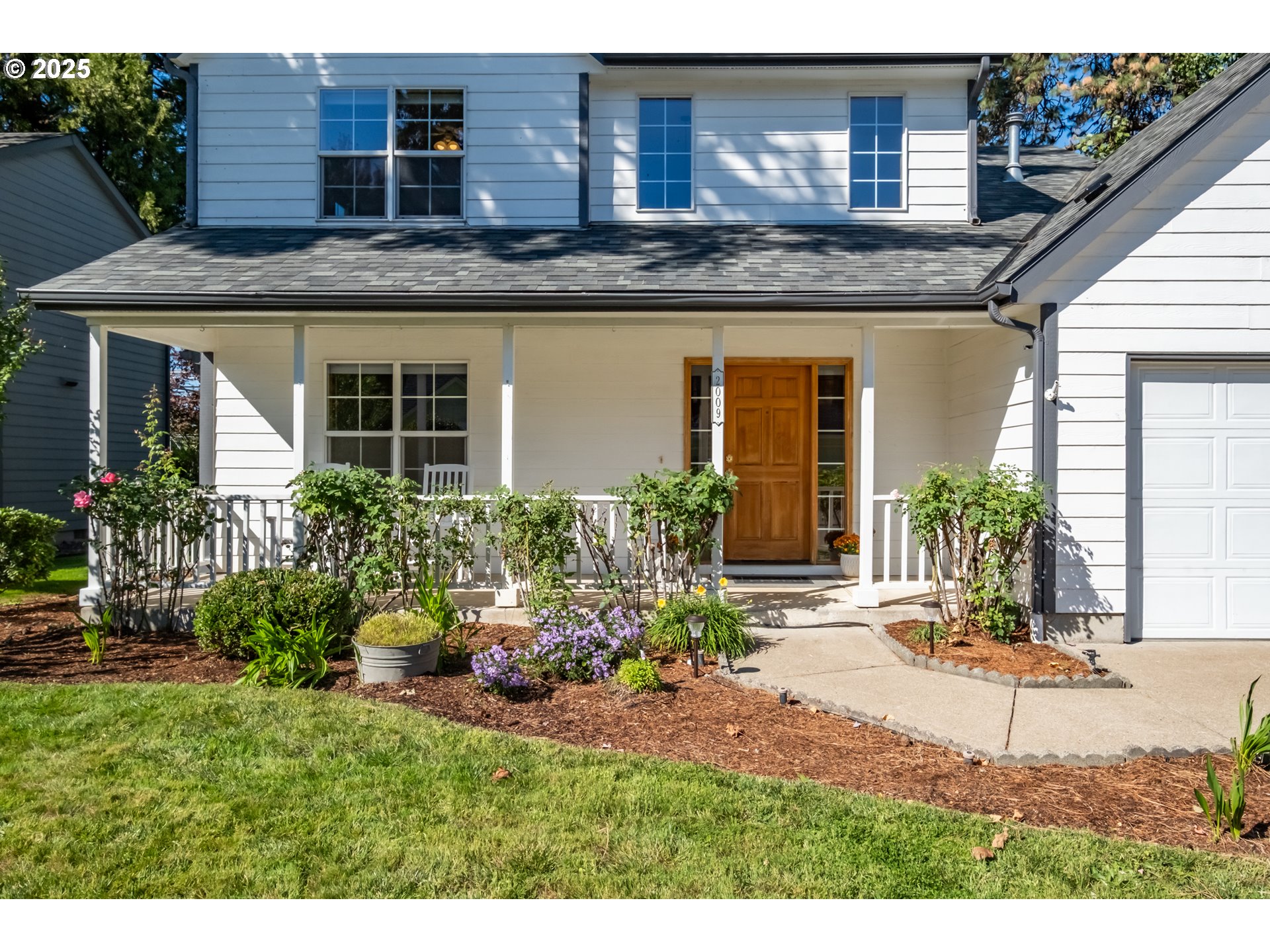 2009 Chase Loop Southwest Albany, OR 97321 - Photo 3 of 48 a view of a house with a yard and plants