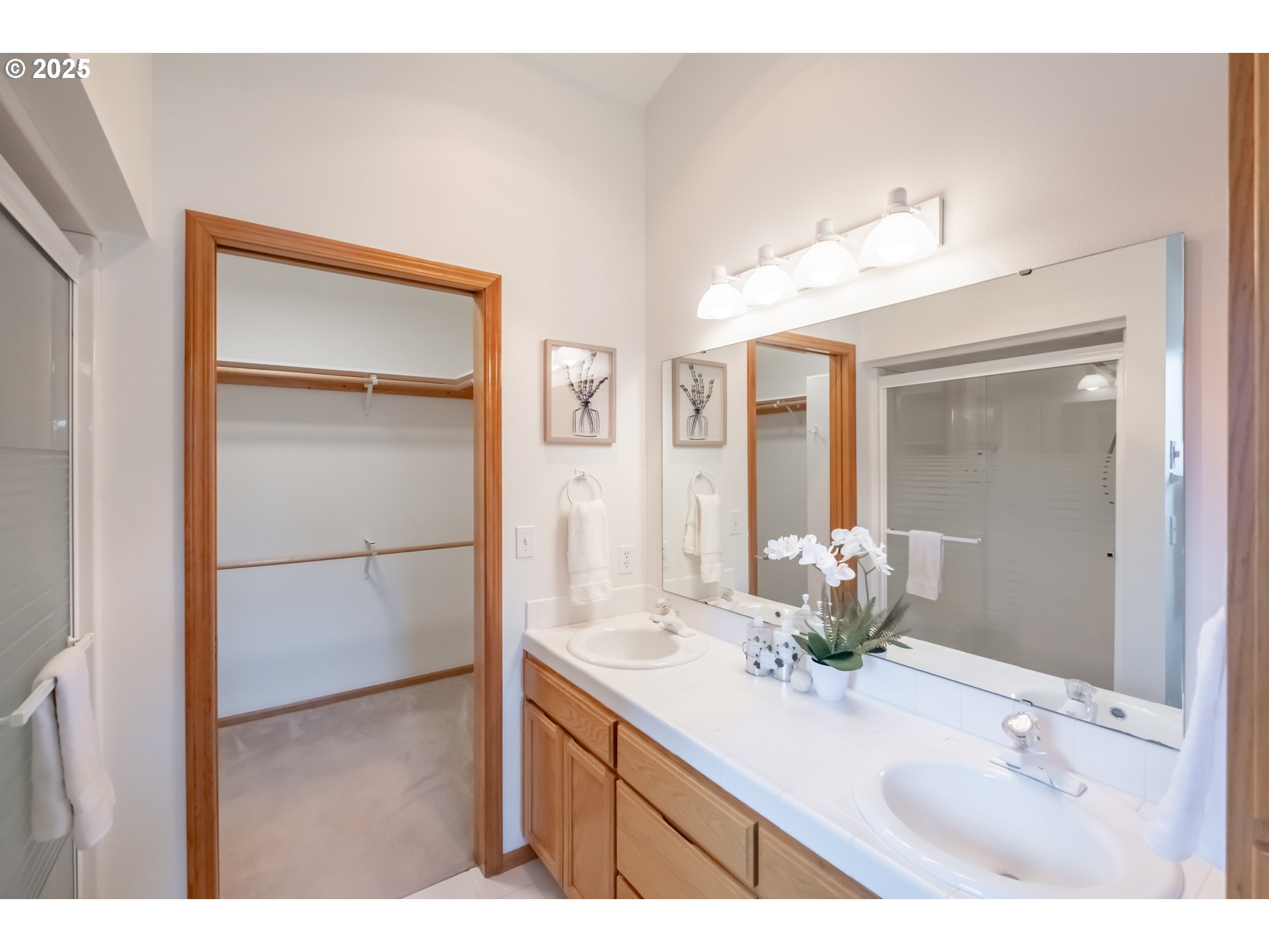 2009 Chase Loop Southwest Albany, OR 97321 - Photo 32 of 48 a bathroom with a sink and a mirror
