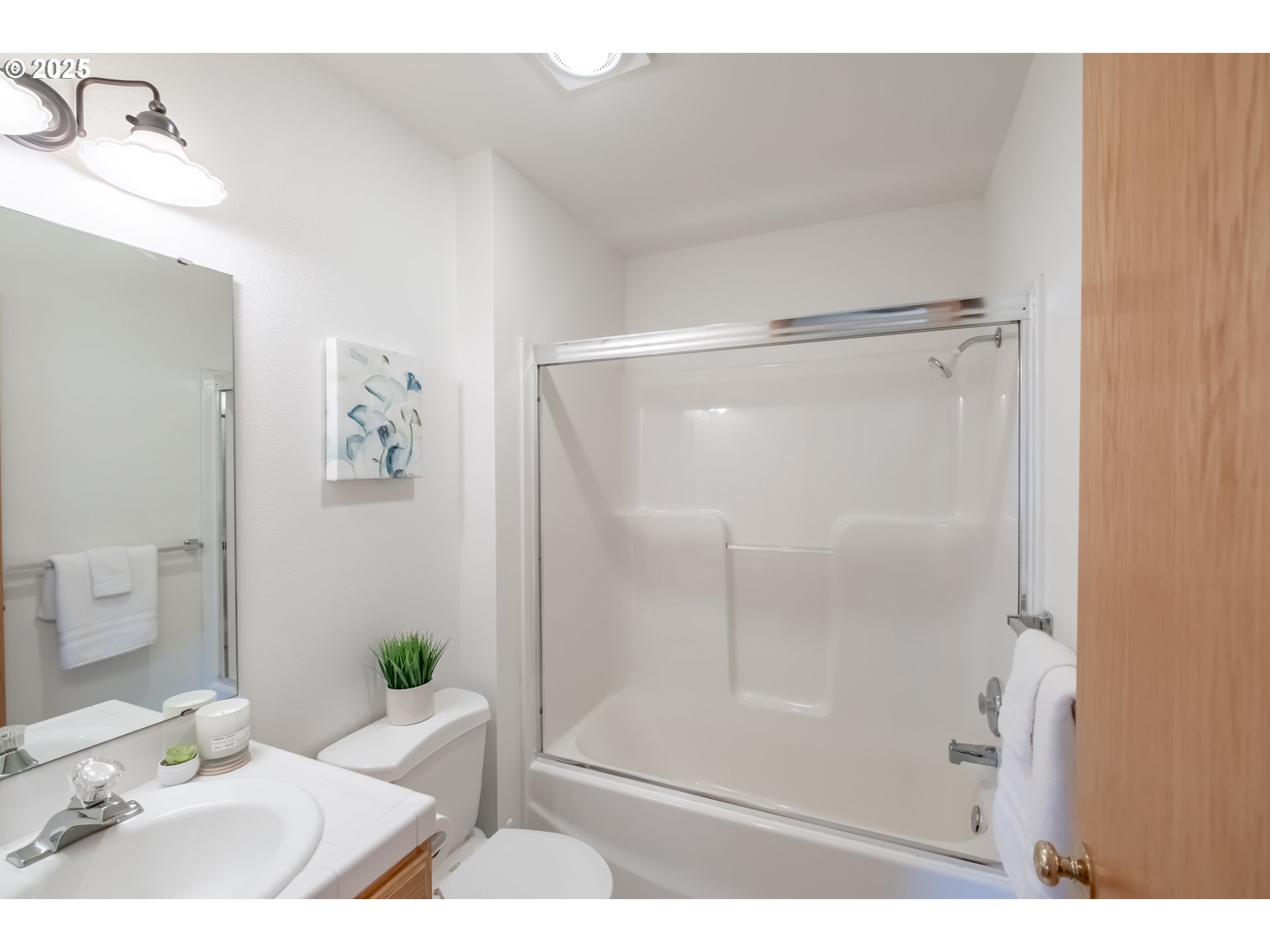 2009 Chase Loop Southwest Albany, OR 97321 - Photo 37 of 48 a bathroom with a sink and a mirror