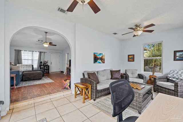 a view of a dining room with furniture