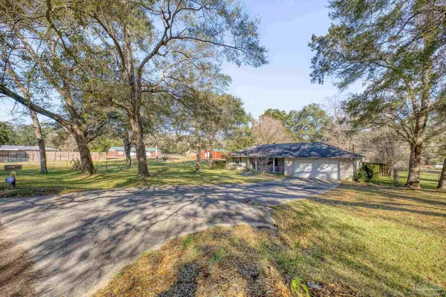 a big room with trees in the background