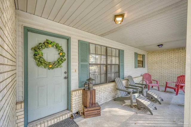 a view of a yard with a tree