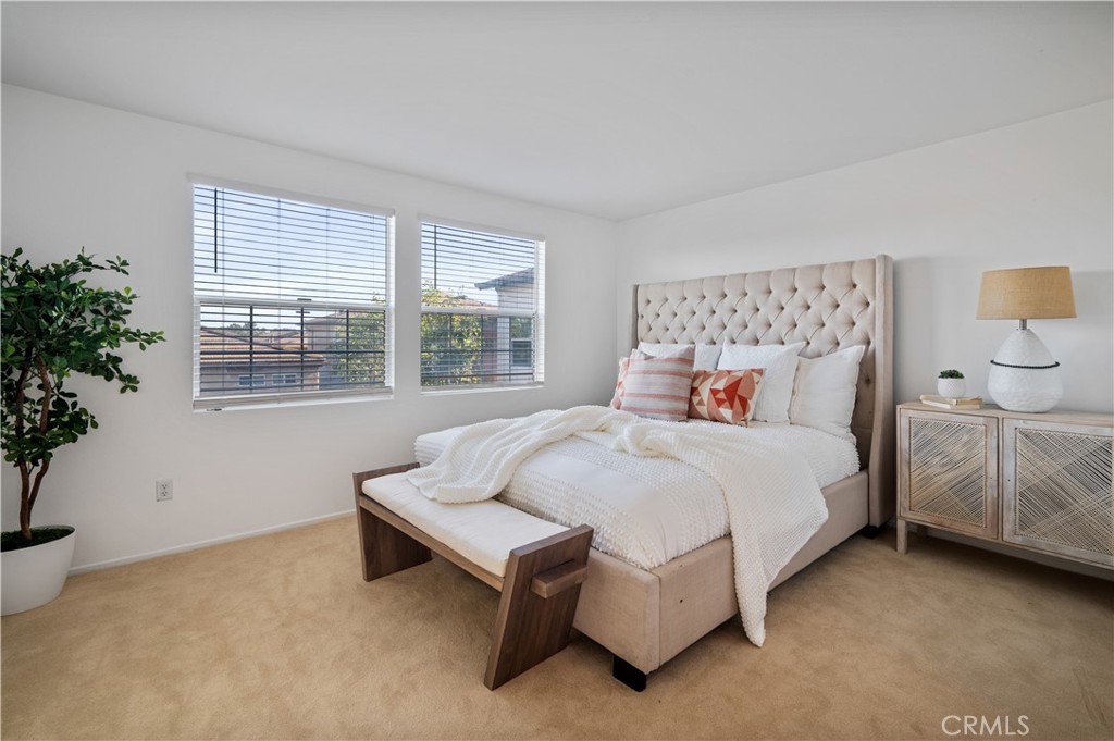 25481 Dodge Avenue, Unit 12 Harbor City, CA 90710 - Photo 20 of 35 a bedroom with a bed and window