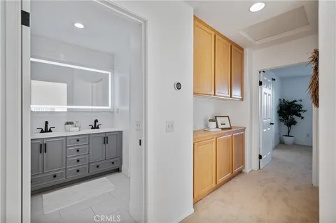 a view of a kitchen with cabinets