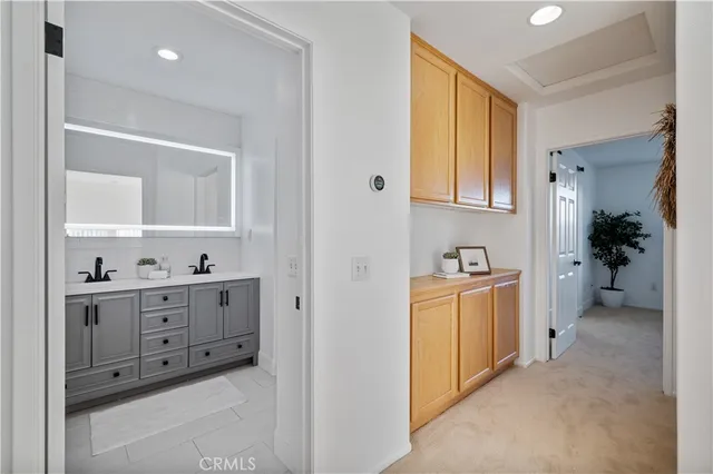 a view of a kitchen with cabinets