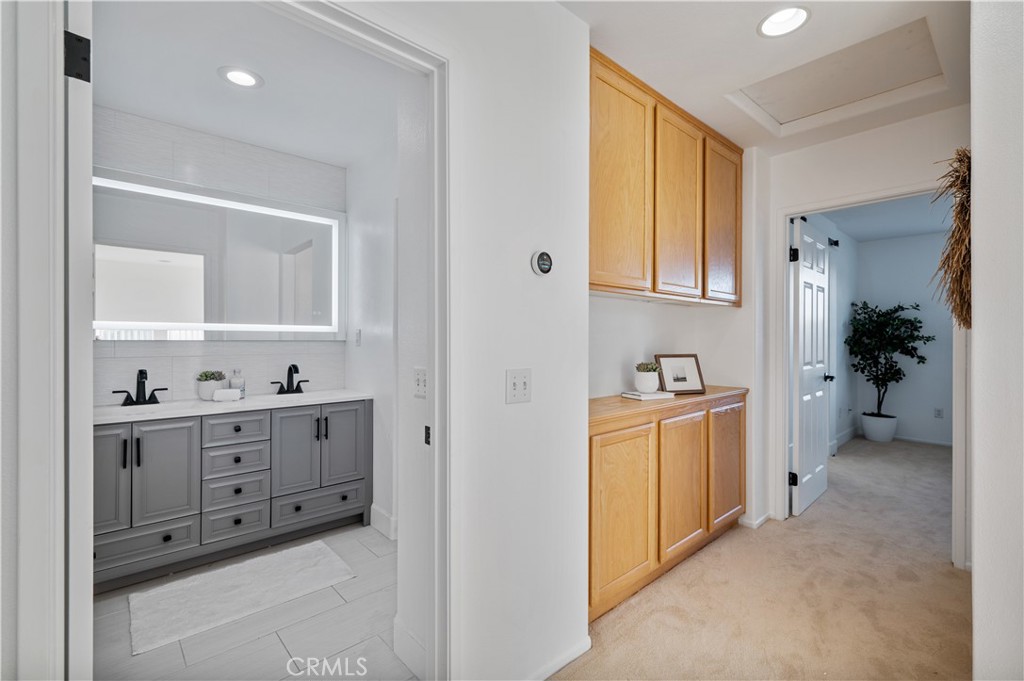 25481 Dodge Avenue, Unit 12 Harbor City, CA 90710 - Photo 25 of 35 a view of a kitchen with cabinets
