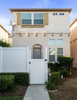 a front view of a house with garage