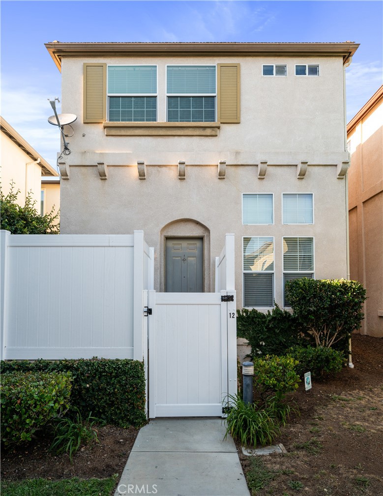 25481 Dodge Avenue, Unit 12 Harbor City, CA 90710 - Photo 31 of 35 a front view of a house with garage