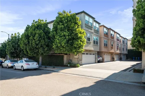 a view of a car park in front of a building