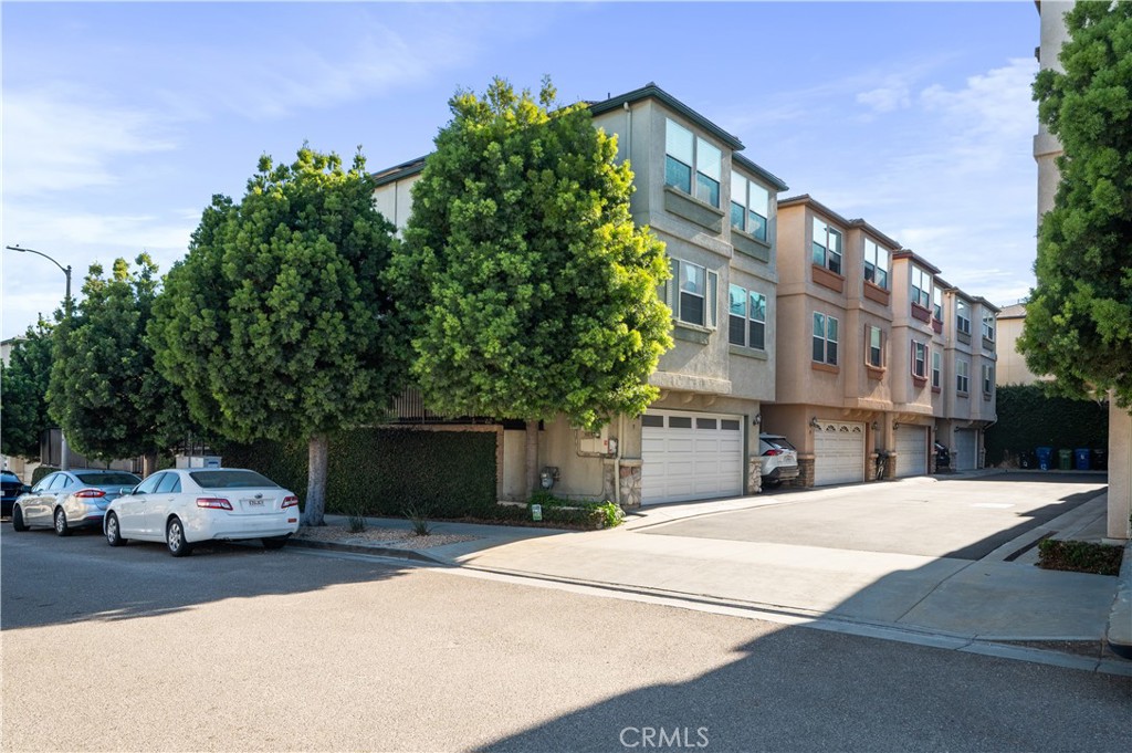 25481 Dodge Avenue, Unit 12 Harbor City, CA 90710 - Photo 35 of 35 a view of a car park in front of a building
