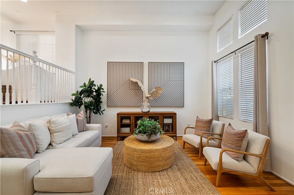 25481 Dodge Avenue, Unit 12 Harbor City, CA 90710 - Photo 5 of 35 a living room with furniture fireplace and a window