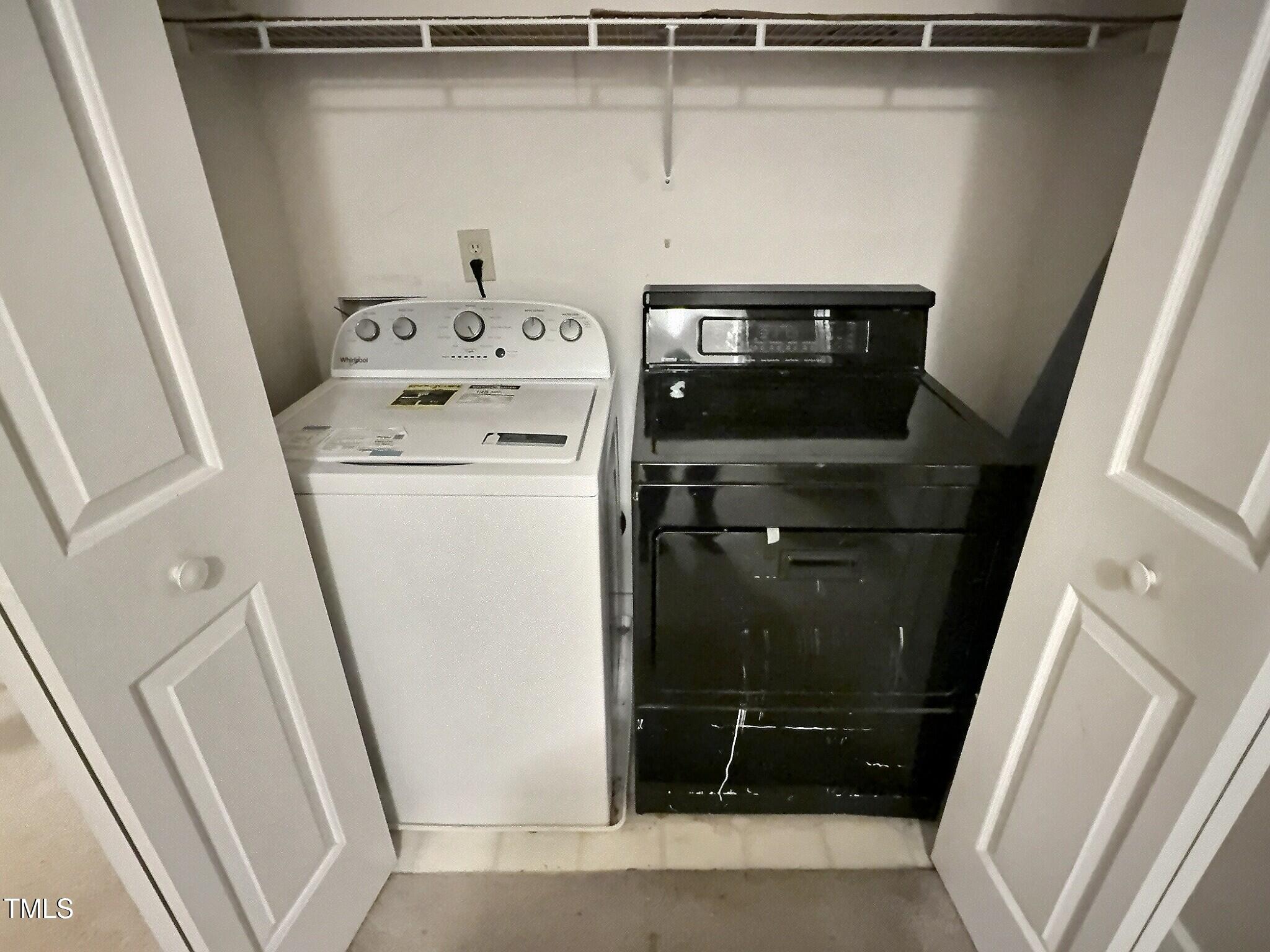 7 Preakness Drive Durham, NC 27713 - Photo 15 of 32 a utility room with dryer and washer