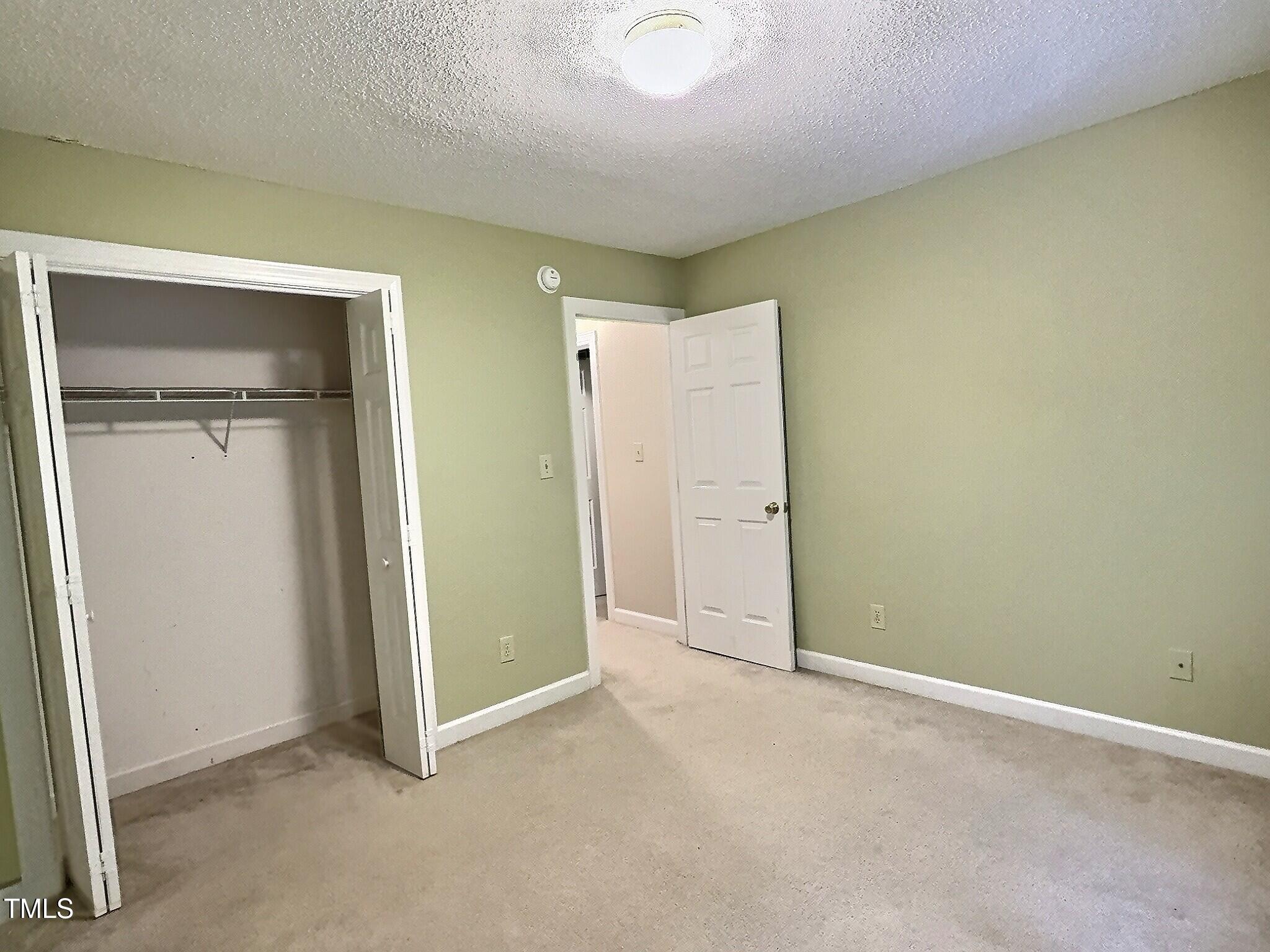 7 Preakness Drive Durham, NC 27713 - Photo 18 of 32 an empty room with closet