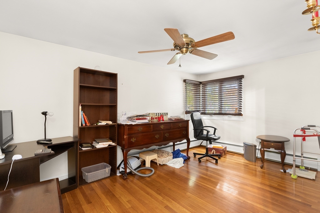 15 Quebec Court Lynn, MA 01905 - Photo 14 of 23 a view of a workspace with furniture and a window