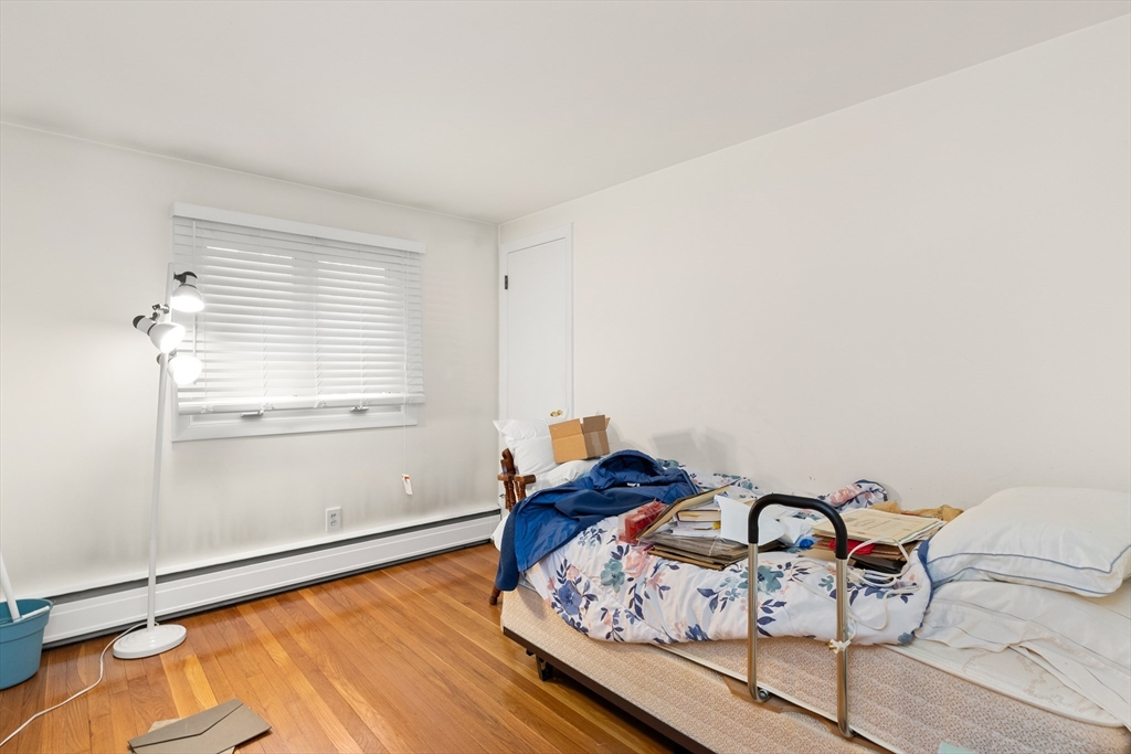 15 Quebec Court Lynn, MA 01905 - Photo 15 of 23 a view of a workspace with furniture and a window