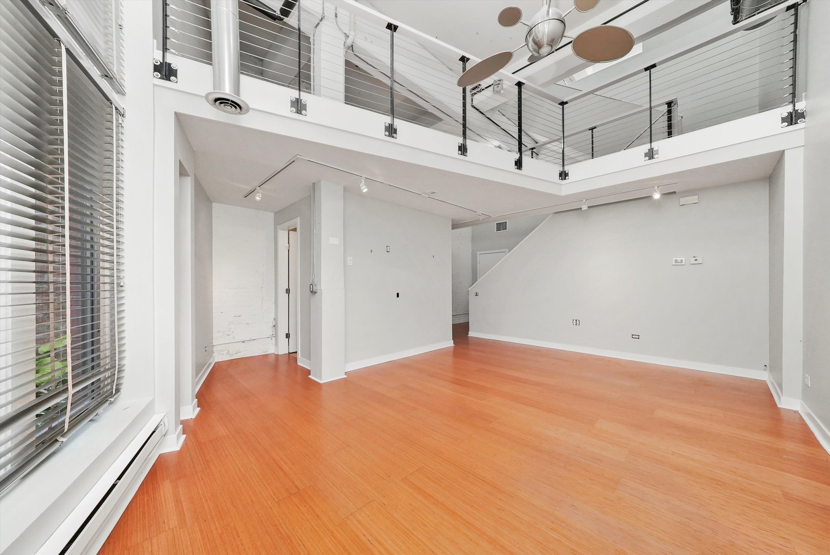 1209 West Cottage Place Chicago, IL 60607 - Photo 3 of 29 a view of a room with windows