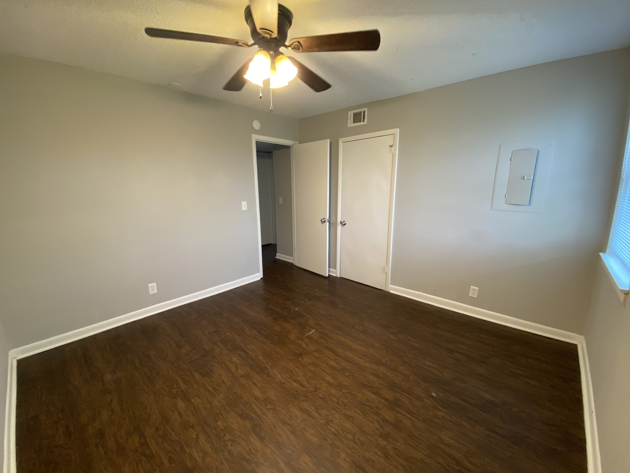 4674 Forest Ridge Drive Hermitage, TN 37076 - Photo 12 of 19 an empty room with wooden floor and ceiling fan