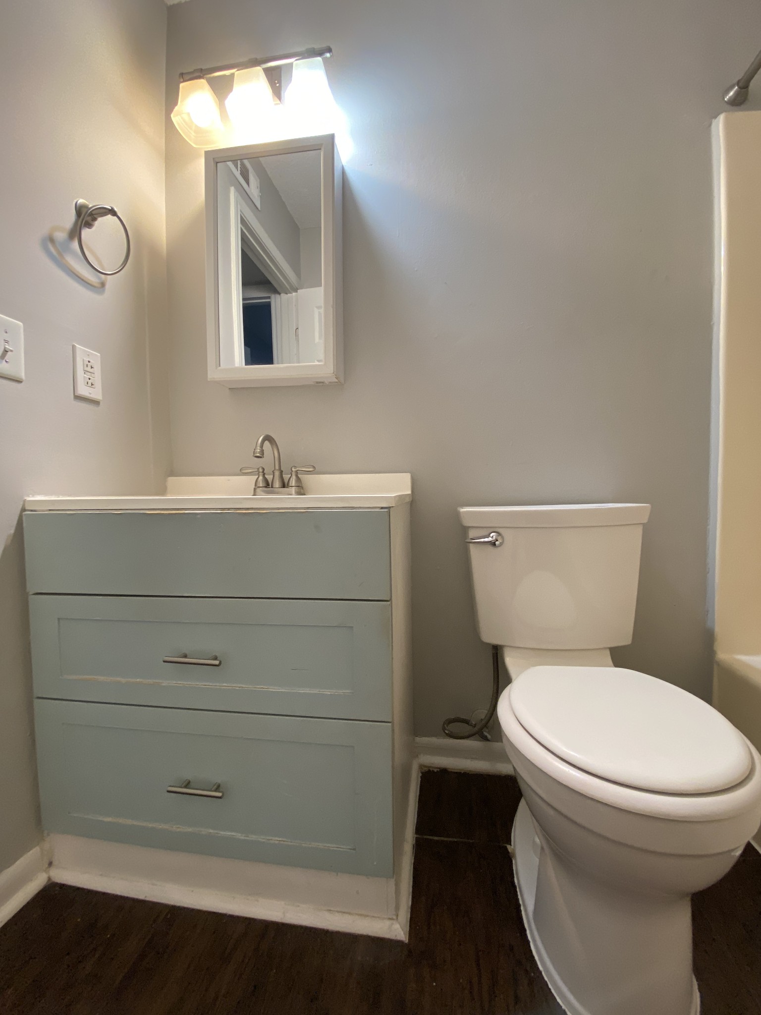 4674 Forest Ridge Drive Hermitage, TN 37076 - Photo 15 of 19 a bathroom with a toilet a sink and mirror