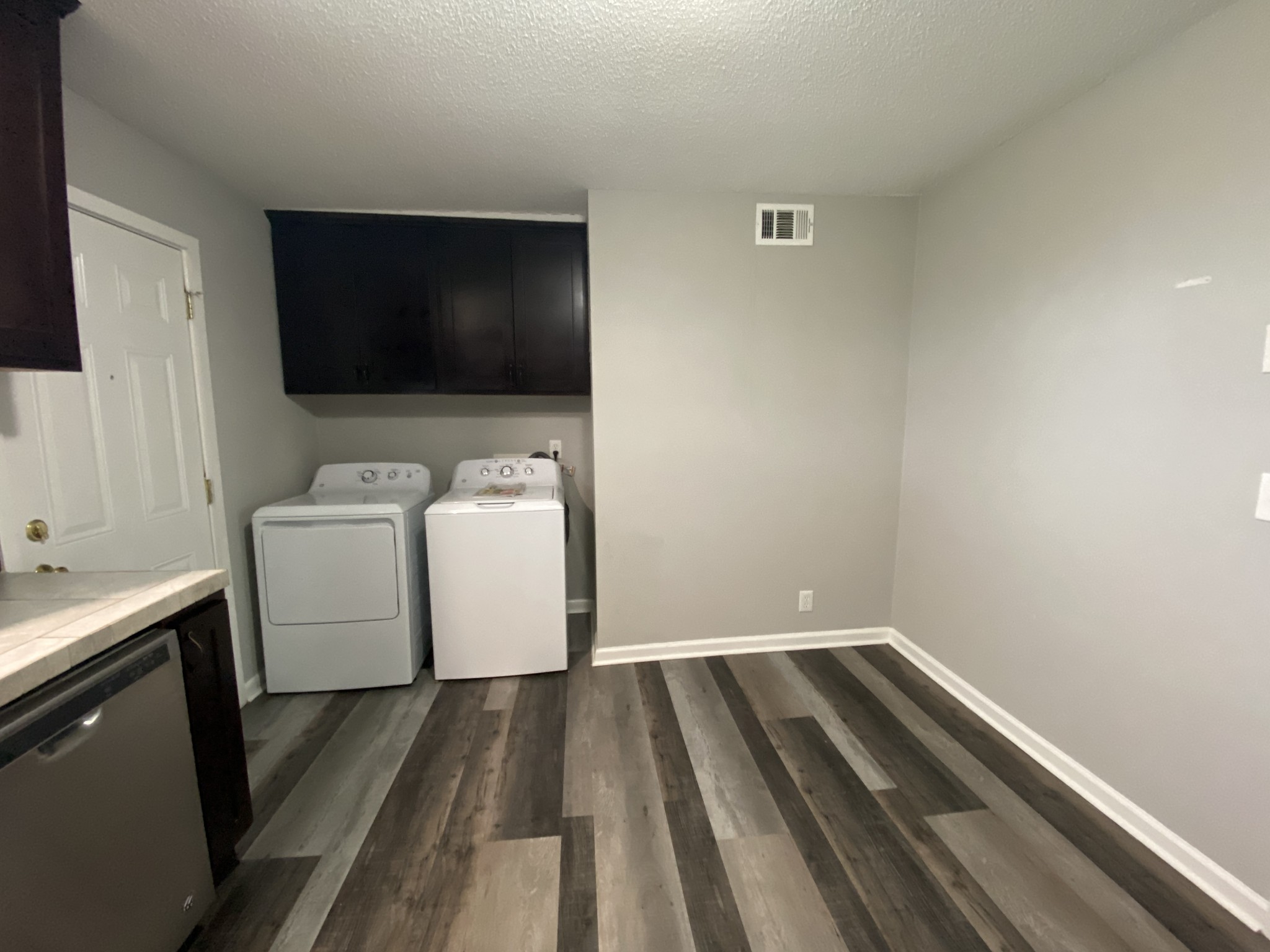 4674 Forest Ridge Drive Hermitage, TN 37076 - Photo 10 of 19 a utility room with dryer and washer